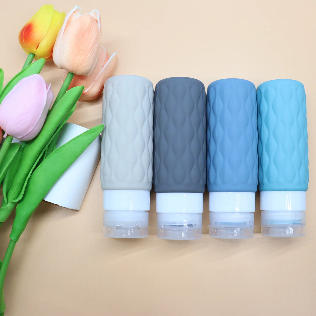4-Pack Travel Refillable Silicone Bottles 100 ml (3.4 fl oz) - Portable Squeeze Lotion & Spray Containers